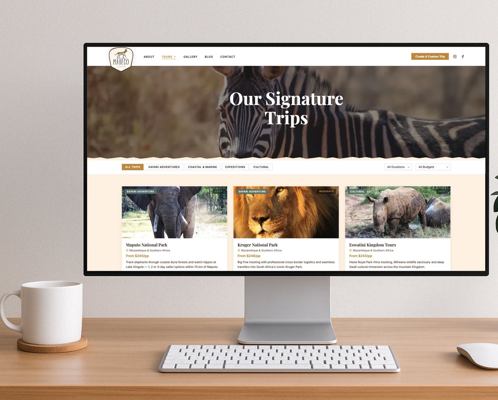 Mabeco Tours signature trips page on desktop — safari tour listings with filter navigation